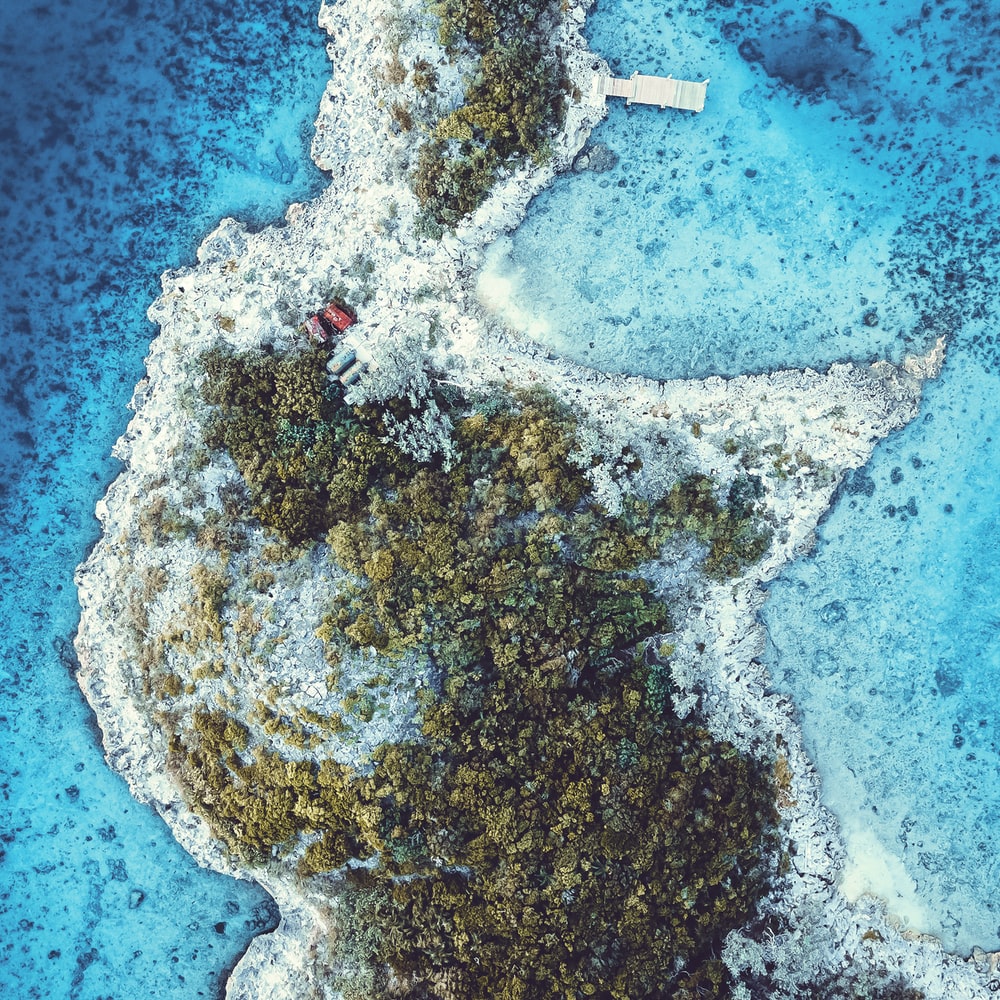 Aerial View Of White And Brown Island raster image