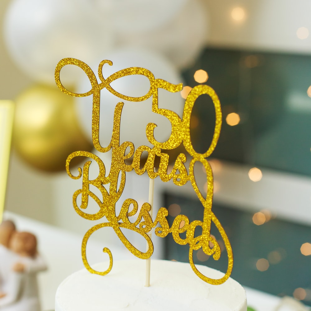 Gold Love Freestanding Letters On White Table raster image