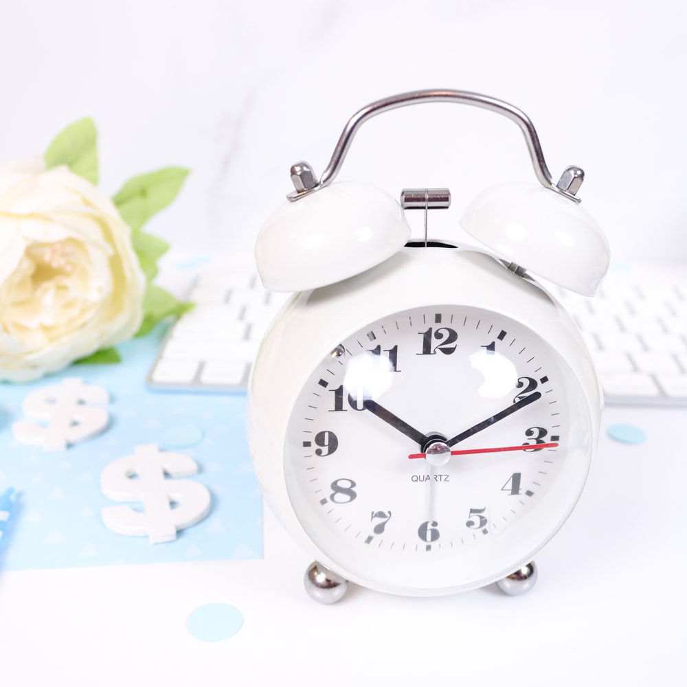 White And Pink Alarm Clock raster image