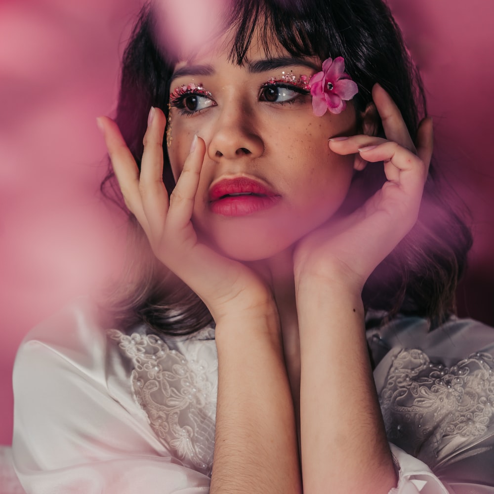 Woman In White Long Sleeve Shirt With Purple Lipstick raster image