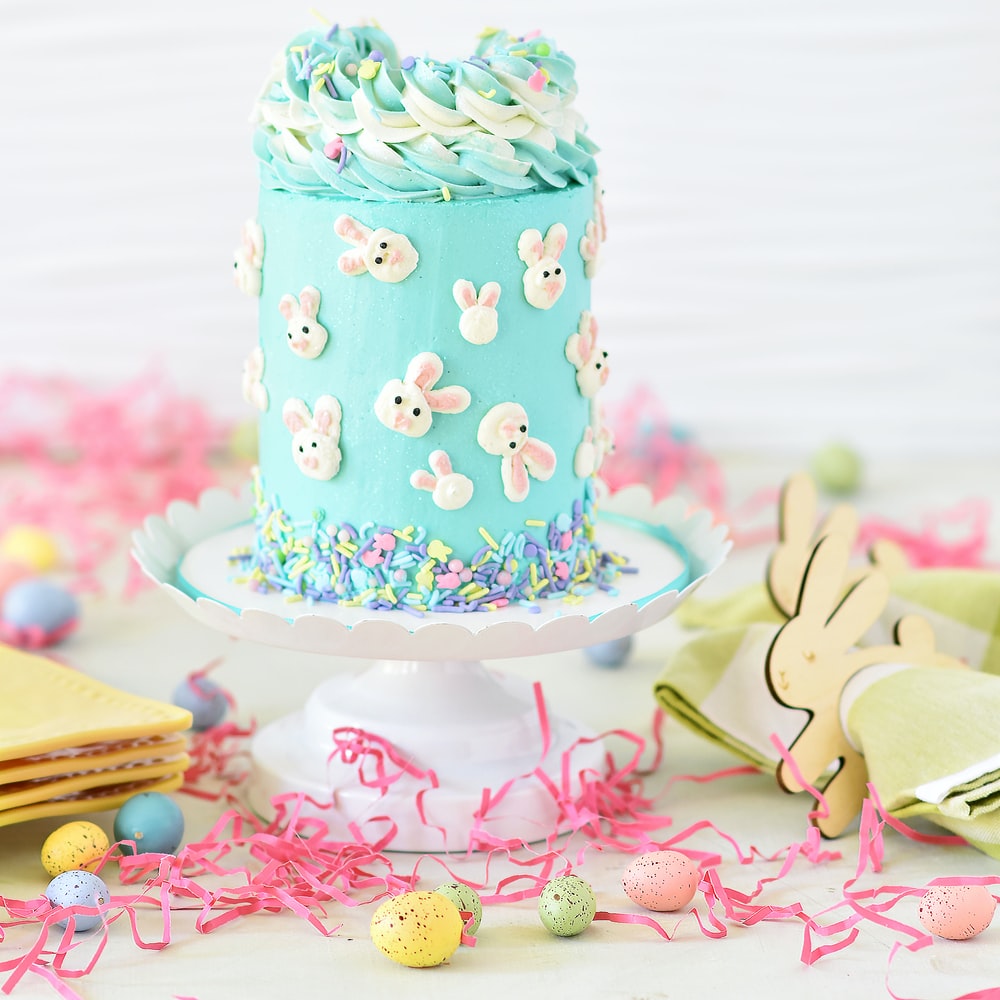 Blue And White Polka Dot Cake On Pink And White Heart Shaped Cake Stand