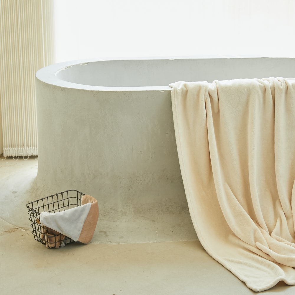 White Bathtub With White Towel raster image