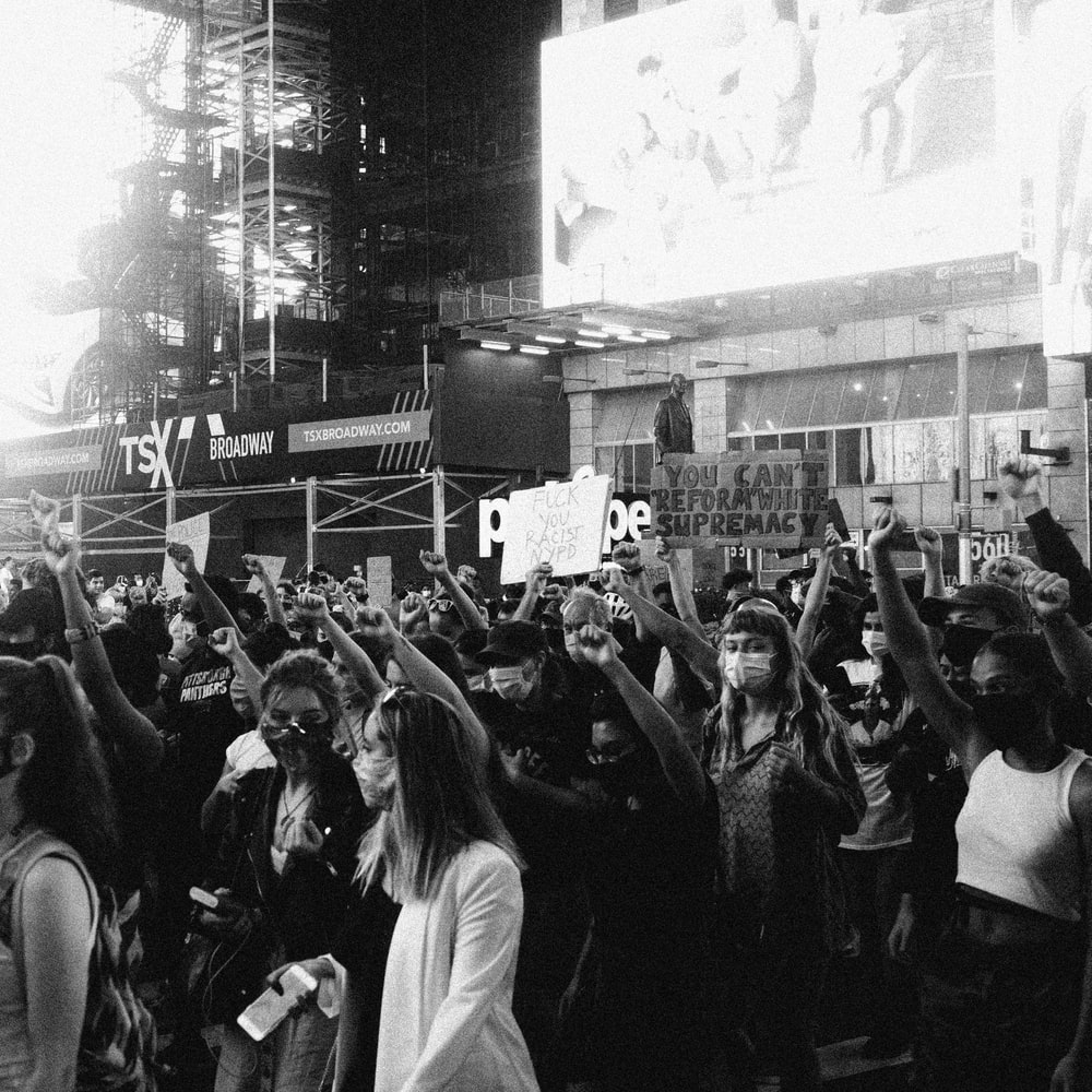 Grayscale Photo Of People In A Concert