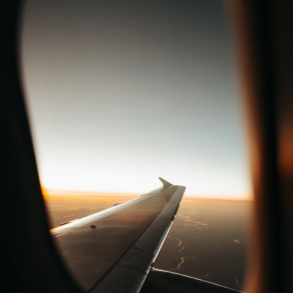 Airplane Window View Of Sunset