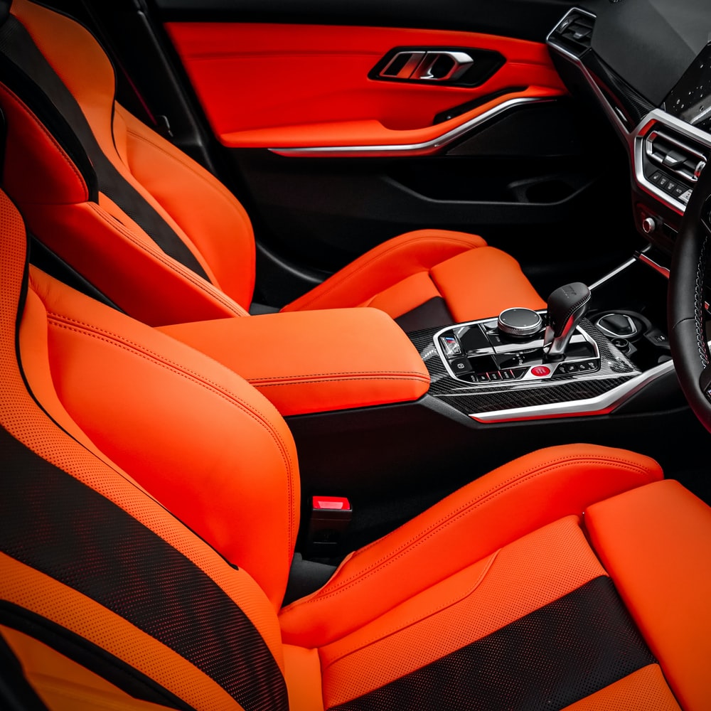 Red And Black Bmw Car Interior raster image