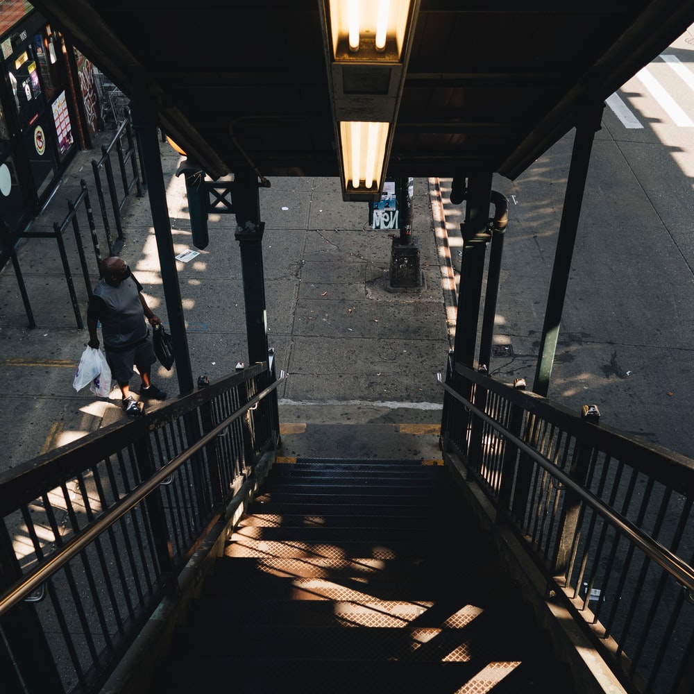 People Walking On Wooden Bridge During Daytime raster image