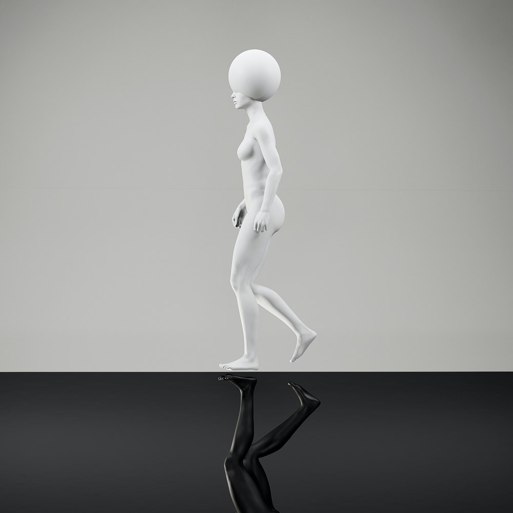 White Woman Dancing Figurine On Black Table